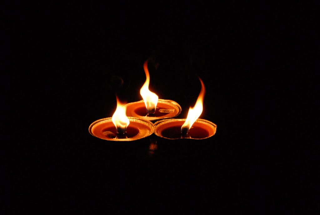 picture of three lighted candles